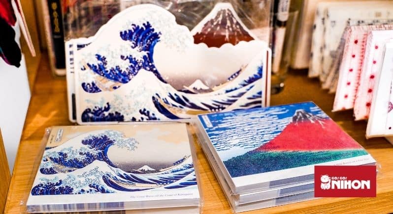 notepads and artworks depicting the art history of mount fuji.