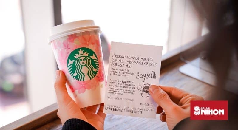 Starbucks drink with receipt with "soy milk"in English in large writing