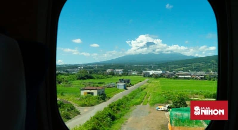 Mt Fuji seen from inside a train