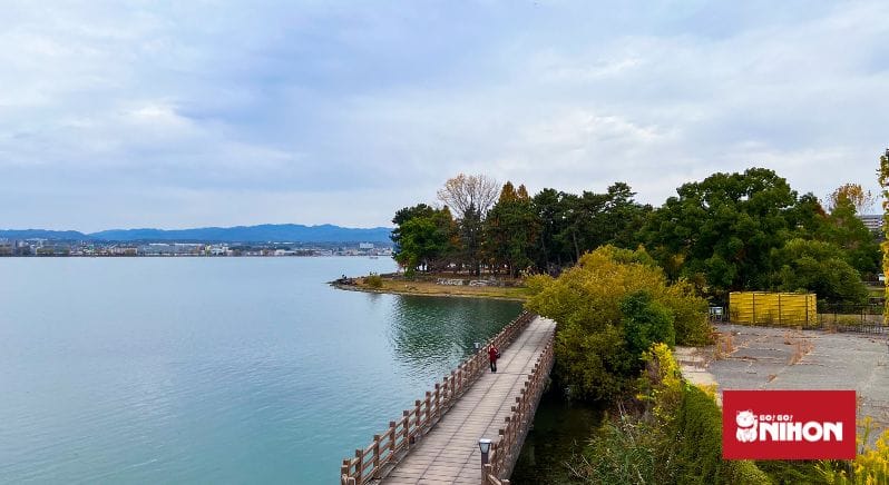 A boardwalk lining the shore of Lake Biwa.