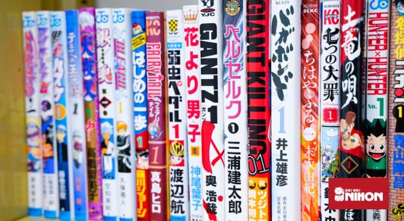 Japanese anime and manga books lined on a shelf.