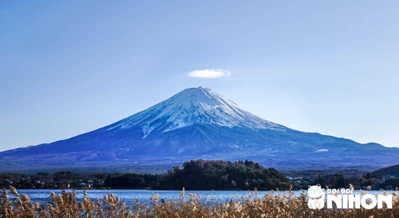 Mount Fuji in the winter seen by bullet train while traveling in the Japanese countryside.
